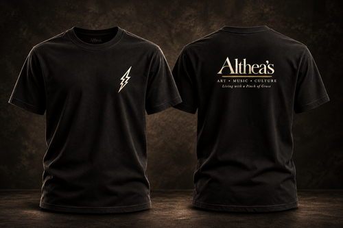 Front small ivory lightning bolt, back modestly sized full Althea's logo; black shirt on dark studio background