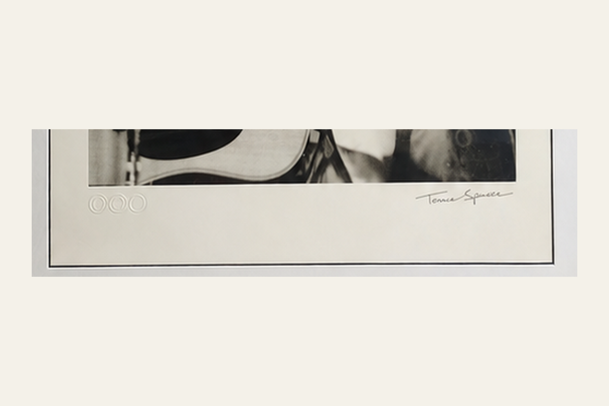 Close-up of Terence Spencer signature and embossed stamps