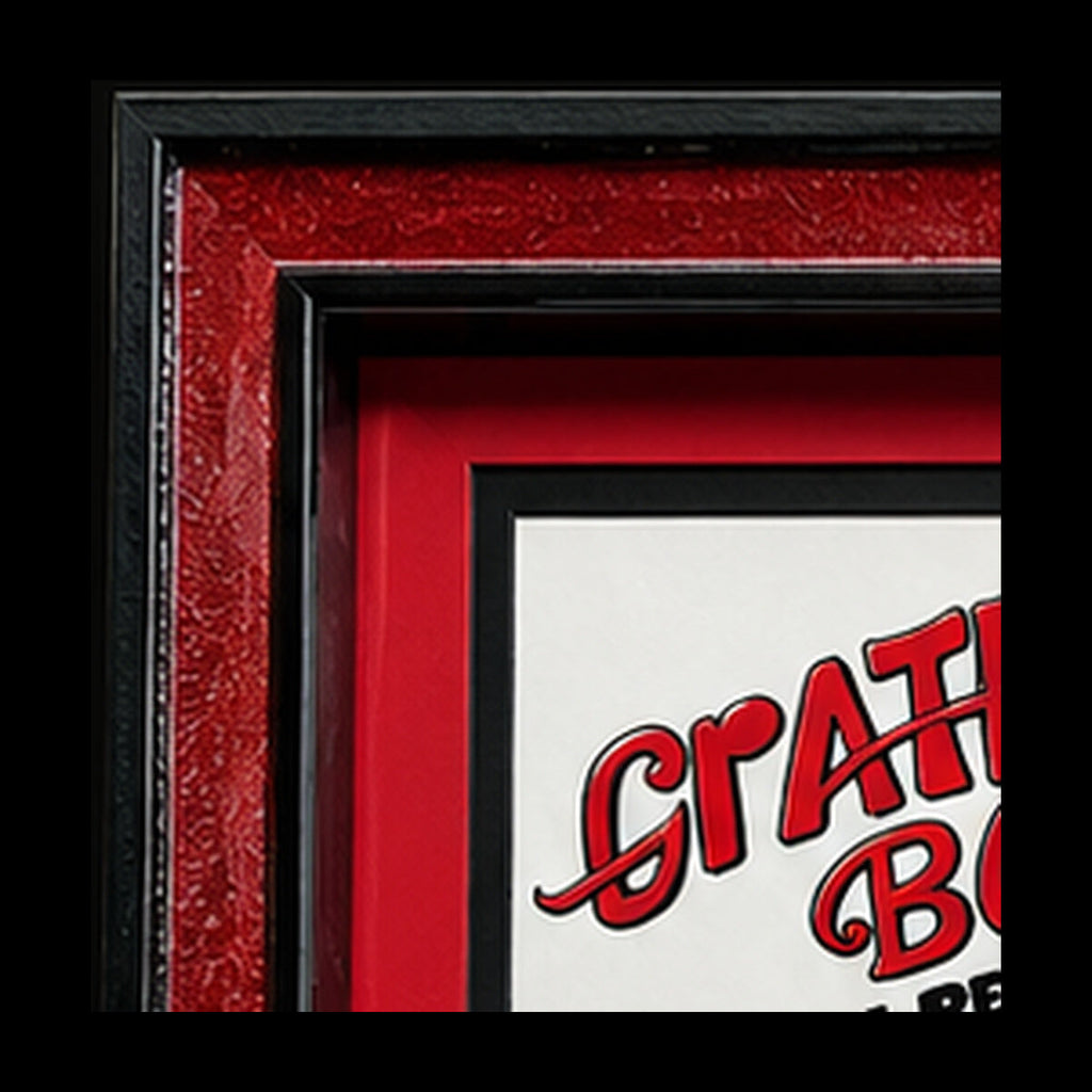 Detail of ruby red glitter custom frame, black trim and red mat