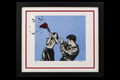 Knockout by Mad, framed and centered against black