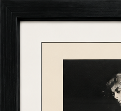 Black gallery frame and white mat detail