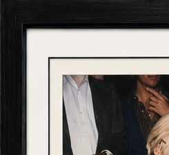 Black gallery frame and white-and-black double mat detail