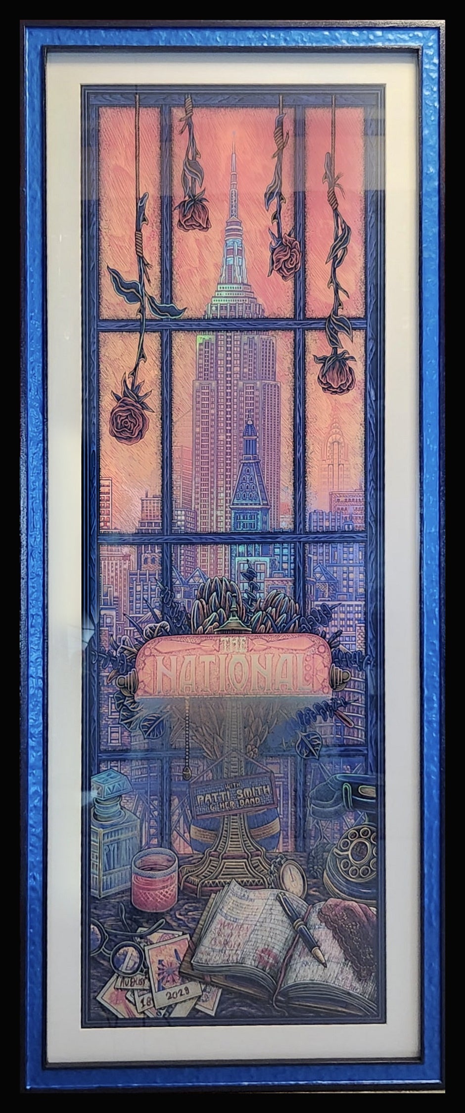 Framed The National and Patti Smith Madison Square Garden poster on black with glass reflection reduced