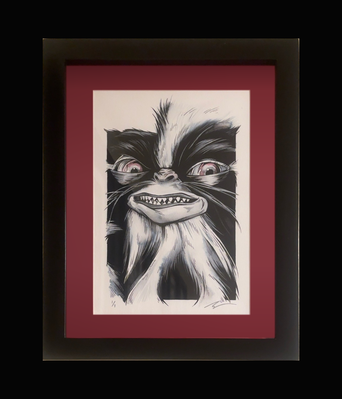 Mohawk from Gremlins original watercolor by Rhys Cooper in full black frame with red mat