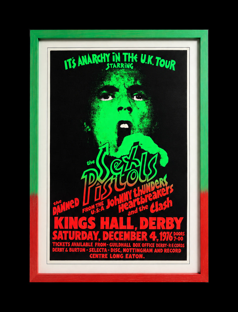 Sex Pistols Anarchy in the U.K. tour poster framed in green and red, centered against black